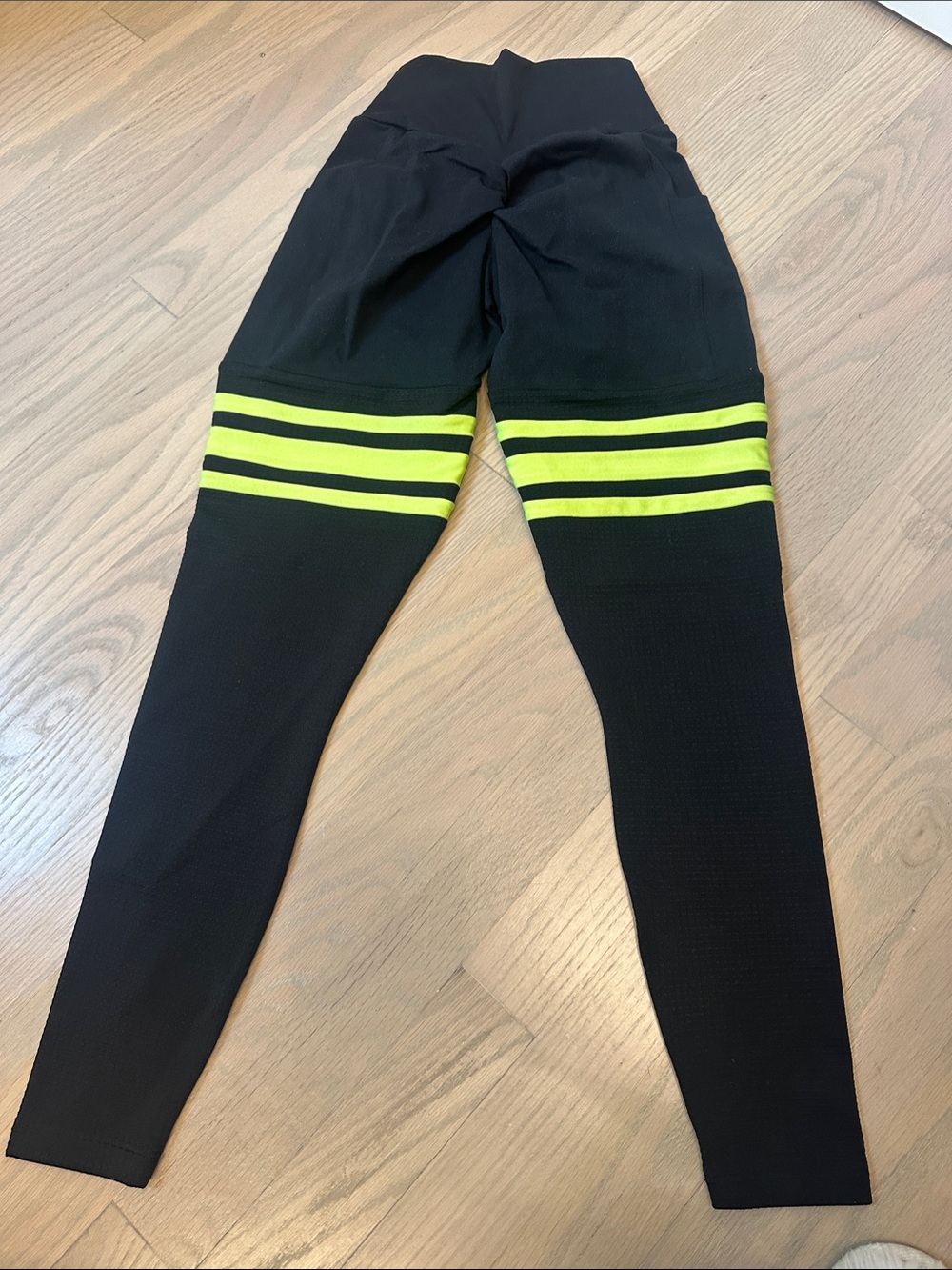 Bombshell Sportswear Black Leggings with Neon Yellow Stripe